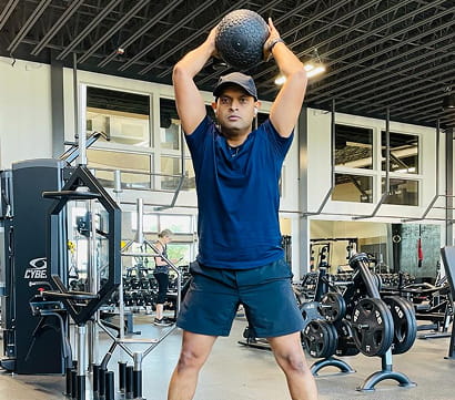 Person using pull-up machine